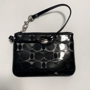 • Black coach wristlet •